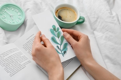 If she's a reader, gift her a book and along with it a painted bookmark. (Shutterstock) If she's a reader, gift her a book and along with it a painted bookmark. (Shutterstock)