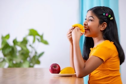 Mangoes are enjoyed by children and adults alike. (Shutterstock) Mangoes are enjoyed by children and adults alike. (Shutterstock)