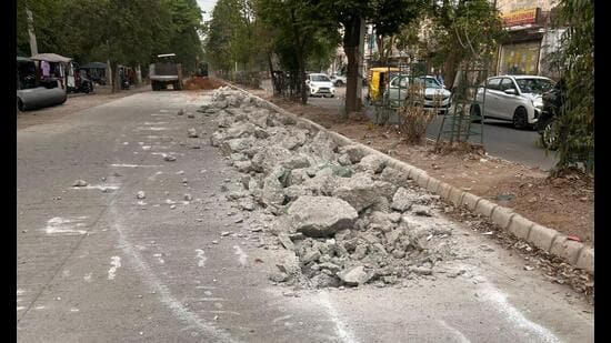 A recently built road in Focal Point area dug up for installation of water pipeline in Ludhiana. (HT Photo)