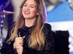 Kelly Clarkson informed her Atlantic City, New Jersey, audience that her hectic daytime TV schedule makes it impractical for her to depart on tour.. (Photo by Charles Sykes/Invision/AP) Kelly Clarkson informed her Atlantic City, New Jersey, audience that her hectic daytime TV schedule makes it impractical for her to depart on tour.. (Photo by Charles Sykes/Invision/AP)