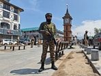 An paramilitary soldier stands at the commercial hub of Lal Chowk in Srinagar