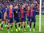 Barcelona's players celebrate victory at the end of the Spanish league football match between FC Barcelona and Real Madrid CF Barcelona's players celebrate victory at the end of the Spanish league football match between FC Barcelona and Real Madrid CF