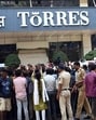 On January 7, 2025, investors gathered in large numbers outside the office of Torres Jewellers in Dadar, Mumbai, demanding the return of their principal amounts after the company failed to pay the promised returns on its investment schemes. (Photo by Raju Shinde/HT Photo) (Hindustan Times)