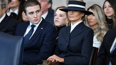 Barron Trump and First Lady Melania Trump listen as US President Donald Trump delivers remarks after being sworn in as the 47th President. (REUTERS)