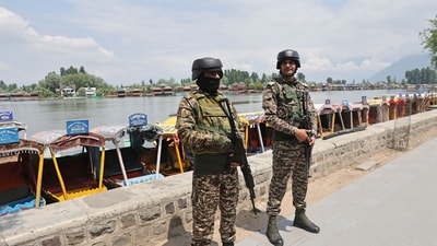 Paramilitary soldiers on the banks of Dal Lake in Srinagar on 10 May 2025. (Waseem Andrabi/HT)