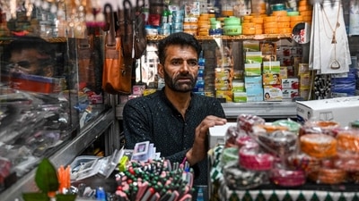 Shops opened on Sunday amid heavy security in bordering areas. In pic: Hazoor Sheikh, a shop owner, waits for customers at his store in the market near the main bus stand in the border town of Poonch in Jammu region on May 11. (AFP) Shops opened on Sunday amid heavy security in bordering areas. In pic: Hazoor Sheikh, a shop owner, waits for customers at his store in the market near the main bus stand in the border town of Poonch in Jammu region on May 11. (AFP)