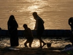 Devotees take holy dip in Prayagraj's Sangam confluence on the occasion of Vaishakh Purnima Devotees take holy dip in Prayagraj's Sangam confluence on the occasion of Vaishakh Purnima