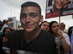 People watch a live broadcast of Israeli-American soldier Edan Alexander as he is released from Hamas captivity in Gaza, at a plaza known as the hostages square in Tel Aviv, Monday, May 12, 2025. People watch a live broadcast of Israeli-American soldier Edan Alexander as he is released from Hamas captivity in Gaza, at a plaza known as the hostages square in Tel Aviv, Monday, May 12, 2025.