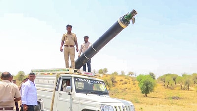 Police retrieve a large missile fragment after attacks by Pakistan, in Barmer on Saturday. (ANI representational photo) Police retrieve a large missile fragment after attacks by Pakistan, in Barmer on Saturday. (ANI representational photo)