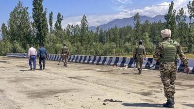Army personnel sanitise the Srinagar-Jammu National Highway in Anantnag district on Monday. Sanitisation exercises have been undertaken across the Jammu and Kashmir to ensure no explosives are left behind after days of cross-border shelling by Pakistan. (PTI Photo) Army personnel sanitise the Srinagar-Jammu National Highway in Anantnag district on Monday. Sanitisation exercises have been undertaken across the Jammu and Kashmir to ensure no explosives are left behind after days of cross-border shelling by Pakistan. (PTI Photo)