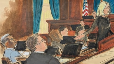 Assistant US Attorney Emily Johnson, right, gestures to Sean Diddy Combs, far left, while giving her opening statement the first day of trial at Manhattan federal court, Monday, May 12, 2025, in New York. (Elizabeth Williams via AP) (AP)