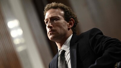 Meta CEO Mark Zuckerberg is rumoured to be pursuing a stablecoin deal to integrate cryptocurrency features across the company’s apps.
(Photo by Brendan SMIALOWSKI / AFP) (AFP) Meta CEO Mark Zuckerberg is rumoured to be pursuing a stablecoin deal to integrate cryptocurrency features across the company’s apps.
(Photo by Brendan SMIALOWSKI / AFP) (AFP)