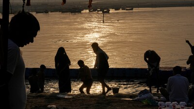 Devotees take holy dip in Prayagraj's Sangam confluence on the occasion of Vaishakh Purnima (Representational image/AP) Devotees take holy dip in Prayagraj's Sangam confluence on the occasion of Vaishakh Purnima (Representational image/AP)