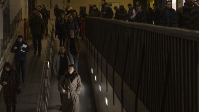 Commuters enter the London Underground at Waterloo railway station in London. (Bloomberg File) Commuters enter the London Underground at Waterloo railway station in London. (Bloomberg File)