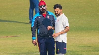 Virat Kohli and Sarandeep Singh inspect the pitch during Delhi's Ranji Trophy match against Railways earlier in 2025. (PTI) Virat Kohli and Sarandeep Singh inspect the pitch during Delhi's Ranji Trophy match against Railways earlier in 2025. (PTI)