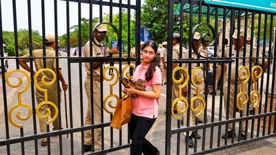 A woman exits Sawai Mansingh Stadium amid evacuation after a bomb threat e-mail, in Jaipur, Thursday, May 8, 2025. (PTI) A woman exits Sawai Mansingh Stadium amid evacuation after a bomb threat e-mail, in Jaipur, Thursday, May 8, 2025. (PTI)
