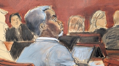 Sean Diddy Combs listens during opening statements on the first day of trial in Manhattan federal court, Monday, May 12, 2025, in New York. (Elizabeth Williams via AP) (AP)