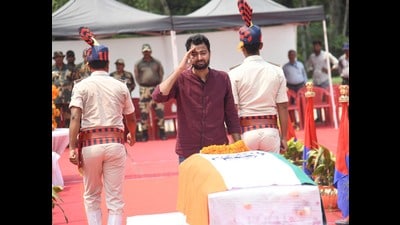Son Imran Raza pays his respects to BSF's Sub Inspector Mohammad Imtiaz , who lost his life in the line of duty in district Jammu, at Jaiprakash Narayan International Airport in Patna, Bihar, on Monday. (Santosh Kumar/HT) Son Imran Raza pays his respects to BSF's Sub Inspector Mohammad Imtiaz , who lost his life in the line of duty in district Jammu, at Jaiprakash Narayan International Airport in Patna, Bihar, on Monday. (Santosh Kumar/HT)
