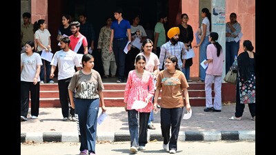 Students coming out from PU CET PG exam center after the exam at Panjab University campus in Chandigarh on Monday. (Ravi Kumar/HT) Students coming out from PU CET PG exam center after the exam at Panjab University campus in Chandigarh on Monday. (Ravi Kumar/HT)