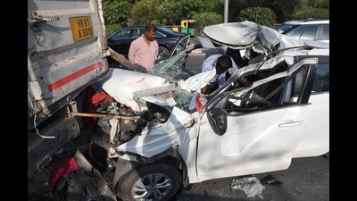 The mangled remains of the car on Zirakpur-Kalka national highway near Sector 3, Panchkula, on Monday. (Sant Arora/HT)