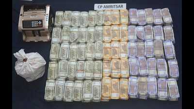 The police have seized 1.10kg of heroin and ₹1.06 crore in hawala money, comprising ₹84.02 lakh in cash. (Sourced) The police have seized 1.10kg of heroin and ₹1.06 crore in hawala money, comprising ₹84.02 lakh in cash. (Sourced)