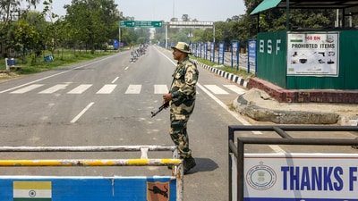 A Border Security Force (BSF) soldier stands guard near India-Pakistan border check post, near Amritsar, Sunday, May 11, 2025. (PTI) A Border Security Force (BSF) soldier stands guard near India-Pakistan border check post, near Amritsar, Sunday, May 11, 2025. (PTI)