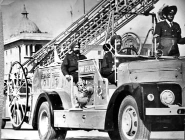 Joginder Singh, whose son Harinder Jeet Singh later followed in his footsteps, standing at the front of a hand-operated fire tender with driver Parkat Singh and fire officer Albel Singh seated at the back during the 1969 Republic Day parade. Joginder Singh, whose son Harinder Jeet Singh later followed in his footsteps, standing at the front of a hand-operated fire tender with driver Parkat Singh and fire officer Albel Singh seated at the back during the 1969 Republic Day parade.