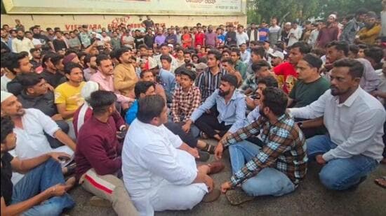 People protest demanding action against accused, on Rani Channamma Circle in Belagavi on Monday (HT photo)