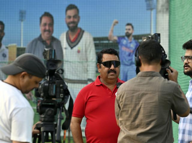 Virat Kohli coach Rajkumar Sharma (in red) at the West Delhi Cricket Academy, Paschim Vihar. (Raj K Raj /HT) Virat Kohli coach Rajkumar Sharma (in red) at the West Delhi Cricket Academy, Paschim Vihar. (Raj K Raj /HT)