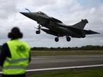 A French fighter aircraft Rafale M, manufactured by Dassault Aviation, takes part in a practice session for a simulated landing on an aircraft carrier at the Landivisiau Navy Air Base (BAN Landivisiau) in Saint-Servais, Brittany, in France.