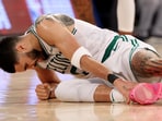 Jayson Tatum #0 of the Boston Celtics holds his ankle on the ground after being injured against the New York Knicks during the fourth quarter in Game Four of the Eastern Conference Second Round NBA Playoffs at Madison Square Garden on May 12, 2025 in New York City. Jayson Tatum #0 of the Boston Celtics holds his ankle on the ground after being injured against the New York Knicks during the fourth quarter in Game Four of the Eastern Conference Second Round NBA Playoffs at Madison Square Garden on May 12, 2025 in New York City.