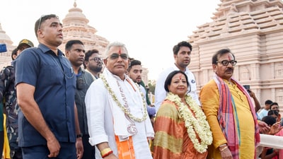 Bharatiya Janata Party (BJP) leader Dilip Ghosh with wife Rinku Majumder and West Bengal Power Minister and TMC leader Aroop Biswas during an event. (PTI/File)