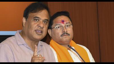 Assam chief minister Himanta Biswa Sarma with state BJP President Dilip Saikia at a news conference in Guwahati on Tuesday (PTI) Assam chief minister Himanta Biswa Sarma with state BJP President Dilip Saikia at a news conference in Guwahati on Tuesday (PTI)