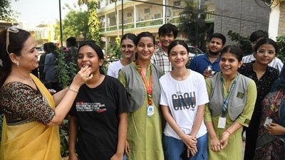 Students were offered sweets after declaration of Class 12 results 2025 at St. Dominic Savio's High School Danapur in Patna. (Santosh Kumar) Students were offered sweets after declaration of Class 12 results 2025 at St. Dominic Savio's High School Danapur in Patna. (Santosh Kumar)