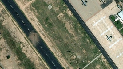 Satellite photos show Mushaf Air Base before and after Indian attacks. Damage to the runway is visible. The ceasefire appeared to hold on May 11 despite prior violations from both sides. (AFP) Satellite photos show Mushaf Air Base before and after Indian attacks. Damage to the runway is visible. The ceasefire appeared to hold on May 11 despite prior violations from both sides. (AFP)