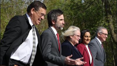 Canada’s new foreign minister Anita Anand (second from right) along with others arrive for a swearing-in ceremony at Rideau Hall in Ottawa, Ontario, Canada, on Tuesday. (Bloomberg) Canada’s new foreign minister Anita Anand (second from right) along with others arrive for a swearing-in ceremony at Rideau Hall in Ottawa, Ontario, Canada, on Tuesday. (Bloomberg)