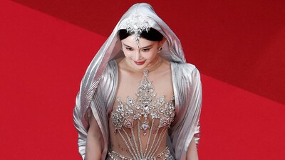A guest poses on the red carpet during arrivals for the opening ceremony and the screening the film "Partir un jour" (Leave One Day) Out of competition at the 78th Cannes Film Festival in Cannes, France, May 13, 2025. REUTERS/Benoit Tessier (REUTERS)