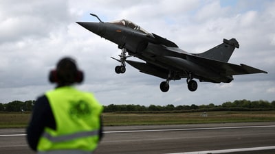 A French fighter aircraft Rafale M, manufactured by Dassault Aviation, takes part in a practice session for a simulated landing on an aircraft carrier at the Landivisiau Navy Air Base (BAN Landivisiau) in Saint-Servais, Brittany, in France. (REUTERS file)