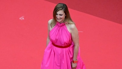 French actress Julie Gayet arrives for the Opening Ceremony and the screening of the film "Partir un Jour" (Bye Bye) presented out of competition at the 78th edition of the Cannes Film Festival in Cannes, southern France, on May 13, 2025. (Photo by Miguel MEDINA / AFP) (AFP) French actress Julie Gayet arrives for the Opening Ceremony and the screening of the film "Partir un Jour" (Bye Bye) presented out of competition at the 78th edition of the Cannes Film Festival in Cannes, southern France, on May 13, 2025. (Photo by Miguel MEDINA / AFP) (AFP)