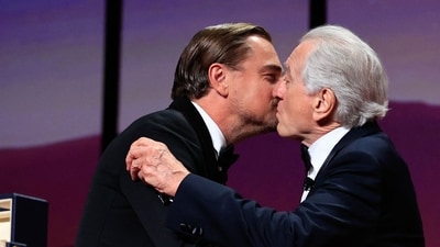 US actor Robert De Niro (R) receives the Honorary Palme d'Or from US actor Leonardo Dicaprio onstage (AFP) US actor Robert De Niro (R) receives the Honorary Palme d'Or from US actor Leonardo Dicaprio onstage (AFP)