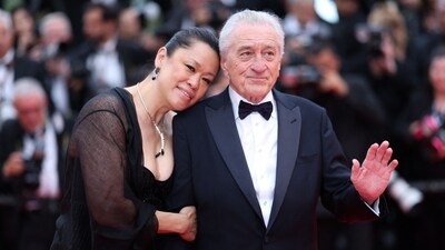 US actor Robert De Niro and his partner Tiffany Chen arrive for the Opening Ceremony and the screening of the film "Partir un Jour" (Bye Bye) presented out of competition at the 78th edition of the Cannes Film Festival in Cannes, southern France, on May 13, 2025. (Photo by Sameer AL-DOUMY / AFP) (AFP) US actor Robert De Niro and his partner Tiffany Chen arrive for the Opening Ceremony and the screening of the film "Partir un Jour" (Bye Bye) presented out of competition at the 78th edition of the Cannes Film Festival in Cannes, southern France, on May 13, 2025. (Photo by Sameer AL-DOUMY / AFP) (AFP)