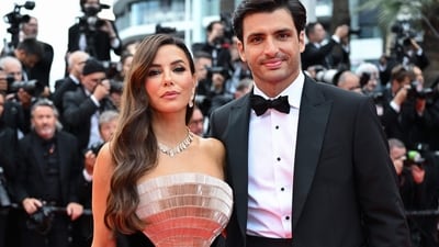 US actress, producer, director Eva Longoria and Spanish Formula One driver Carlos Jr Sainz arrive for the Opening Ceremony and the screening of the film "Partir un Jour" (Bye Bye) presented out of competition at the 78th edition of the Cannes Film Festival in Cannes, southern France, on May 13, 2025. (Photo by Bertrand GUAY / AFP) (AFP) US actress, producer, director Eva Longoria and Spanish Formula One driver Carlos Jr Sainz arrive for the Opening Ceremony and the screening of the film "Partir un Jour" (Bye Bye) presented out of competition at the 78th edition of the Cannes Film Festival in Cannes, southern France, on May 13, 2025. (Photo by Bertrand GUAY / AFP) (AFP)