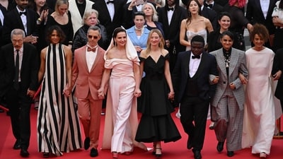 (From L) South korean filmmaker and member of the jury of the 78th cannes film festival Hong Sang-Soo, US actress and member of the jury of the 78th cannes film festival Halle Berry, US actor and member of the jury of the 78th cannes film festival Jeremy Strong, French actress and president of the jury of the 78th Cannes film festival Juliette Binoche, Italian actress and member of the jury of the 78th cannes film festival Alba Rohrwacher, Congolese filmmaker and member of the jury of the 78th cannes film festival Dieudo Hamadi, Indian filmmaker and member of the jury of the 78th cannes film festival Payal Kapadia, French-Moroccan writer and journalist and member of the jury of the 78th cannes film festival Leila Slimani arrive for the Opening Ceremony and the screening of the film "Partir un Jour" (Bye Bye) presented out of competition at the 78th edition of the Cannes Film Festival in Cannes, southern France, on May 13, 2025. (Photo by Antonin THUILLIER / AFP) (AFP) (From L) South korean filmmaker and member of the jury of the 78th cannes film festival Hong Sang-Soo, US actress and member of the jury of the 78th cannes film festival Halle Berry, US actor and member of the jury of the 78th cannes film festival Jeremy Strong, French actress and president of the jury of the 78th Cannes film festival Juliette Binoche, Italian actress and member of the jury of the 78th cannes film festival Alba Rohrwacher, Congolese filmmaker and member of the jury of the 78th cannes film festival Dieudo Hamadi, Indian filmmaker and member of the jury of the 78th cannes film festival Payal Kapadia, French-Moroccan writer and journalist and member of the jury of the 78th cannes film festival Leila Slimani arrive for the Opening Ceremony and the screening of the film "Partir un Jour" (Bye Bye) presented out of competition at the 78th edition of the Cannes Film Festival in Cannes, southern France, on May 13, 2025. (Photo by Antonin THUILLIER / AFP) (AFP)