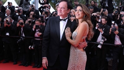 US film director Quentin Tarantino and his wife Israeli singer Daniella Pick arrive for the Opening Ceremony and the screening of the film "Partir un Jour" (Bye Bye) presented out of competition at the 78th edition of the Cannes Film Festival in Cannes, southern France, on May 13, 2025. (Photo by Sameer Al-Doumy / AFP) (AFP) US film director Quentin Tarantino and his wife Israeli singer Daniella Pick arrive for the Opening Ceremony and the screening of the film "Partir un Jour" (Bye Bye) presented out of competition at the 78th edition of the Cannes Film Festival in Cannes, southern France, on May 13, 2025. (Photo by Sameer Al-Doumy / AFP) (AFP)