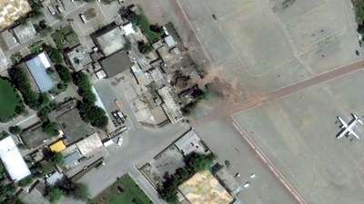 This image shows a damaged building at Nur Khan airbase after Indian airstrikes. Prior to this, Pakistan used drones and heavy artillery to hit civilian areas across the LoC, resulting in casualties. (via REUTERS)