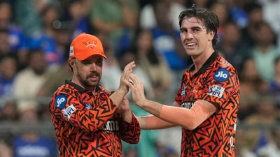 Sunrisers Hyderabad's captain Pat Cummins, right, celebrates with teammate Travis Head. (AP) Sunrisers Hyderabad's captain Pat Cummins, right, celebrates with teammate Travis Head. (AP)