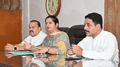 Mayor Inderjit Kaur among other officials during a meeting in MC’s zone A office on Tuesday. (HT Photo)