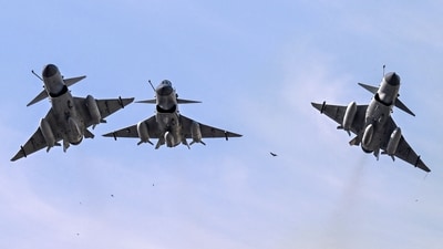 Pakistan Air Force J-10 fighter jets fly past over the President's House during the national day parade in Islamabad on March 23, 2025. (Photo by Aamir QURESHI / AFP) Pakistan Air Force J-10 fighter jets fly past over the President's House during the national day parade in Islamabad on March 23, 2025. (Photo by Aamir QURESHI / AFP)