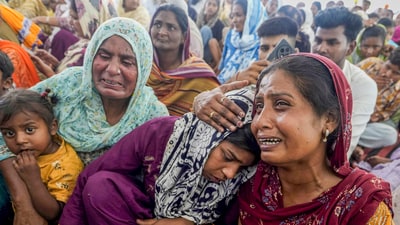 Relatives of those who lost their lives in the Punjab hooch tragedy have been mourning their deaths after they consumed spurious liquor. (PTI) Relatives of those who lost their lives in the Punjab hooch tragedy have been mourning their deaths after they consumed spurious liquor. (PTI)