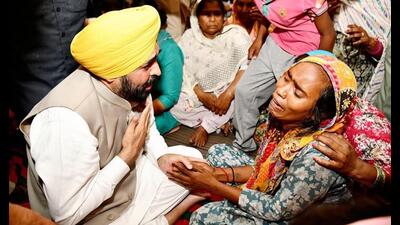 Punjab chief minister Bhagwant Mann meet the family members of the persons who died of spurious liquor at Majitha in Amritsar on Tuesday. (Hindustan Times) Punjab chief minister Bhagwant Mann meet the family members of the persons who died of spurious liquor at Majitha in Amritsar on Tuesday. (Hindustan Times)